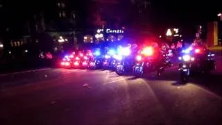 Victoria city motorcycle police herding people with their Victory motorcycles