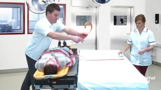 Samarit Surgiboard with a Ferno Scoop Stretcher for Lateral Transfers - Hospital Direct Acute