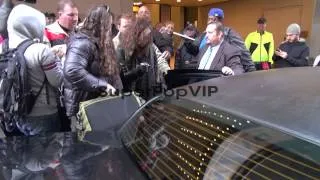 Steven Tyler of Aerosmith getting into his car outside VH...