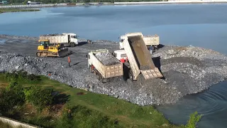 Great job !! incredible Excellent Techniques operator Driver dump truck unloading Stone Into water