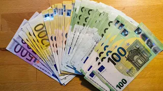 Counting 100, 200 and 500 EURO banknotes