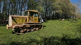 Pulling stumps with a Soviet crawler tractor T-74
