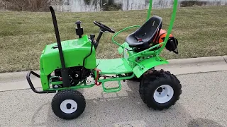 Mini Scamp Farm Tractor From SaferWholesale With Optional Trailer, Sprayer & More