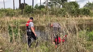 Snipers protect Florida divers searching for human remains in gator-infested waters