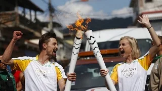 Полина Гагарина и Дима Билан в эстафете олимпийского огня в Бразилии 2016