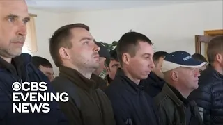 Inside Ukrainian military base training civilians