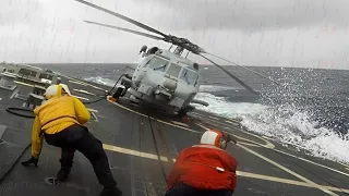 Helicopters Struggling to Land on the Ship