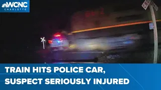 Video shows train hit occupied patrol car