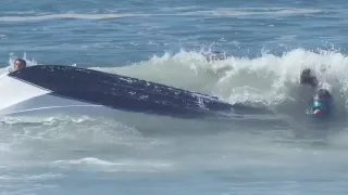 Surfers save two kids