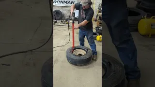 Esco model 20408 dismount tool. Pulling off a extreme duty 14 ply trailer tire.