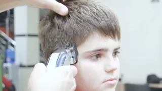 Curiosity-Inducing HD Video: Discover the Amazing Techniques of Boy Haircutting