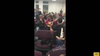 Daoirí Farrell perform Wild Rover in Newcastle Airport