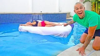 GIRLFRIEND WAKES UP IN SWIMMING POOL PRANK!