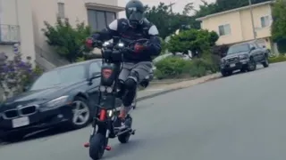 Electric Scooter Kaabo Wolf Warrior 11 Commute to work! Raced a Harley