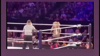 Liv Morgan slapping Natalya butt at the live event 7/10/22