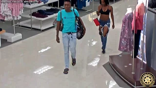 Surveillance video: Couple allegedly shoplifting in Kohl's