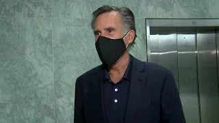 Mitt Romney speaks to reporters after getting COVID-19 vaccine