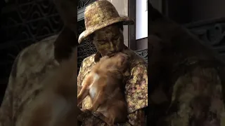 Dog’s epic performance with living statue. 2019