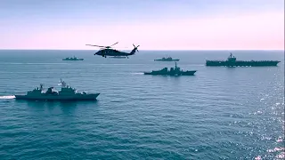 U.S. Navy Carrier Strike Group and ROK Navy steam in formation