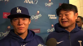 Yoshinobu Yamamoto talks to the media after his first start at Dodger Stadium.