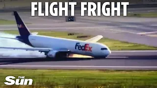 Terrifying moment Boeing plane NOSEDIVES on runway sending sparks flying after landing gear failed