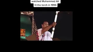 Muhammad Ali lighting the olympic torch in 1996