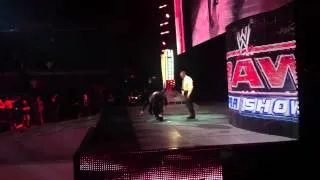 Vince Mcmahon kicking John Laurinaitis's butt