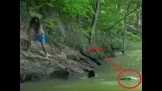 Crazy Man Jump On Alligator To Save His Friend