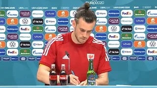 Gareth Bale Signs Autographs During His Man Of The Match Press Conference