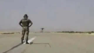 Fearless man facing extra low fighter jet flyby