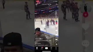 Salty dude throws his jersey on the ice