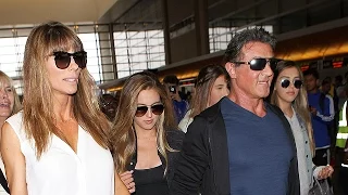 Sly Stallone Has A Cheering Squad At LAX