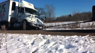 Chevy Duramax pulls Semi truck out of the ditch.