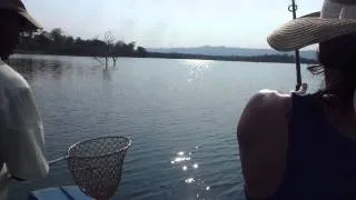 Hot chick catches tiger fish on lake Kariba