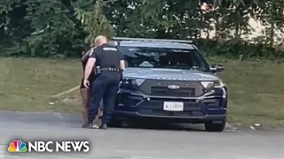 Maryland officer suspended after viral video shows backseat encounter