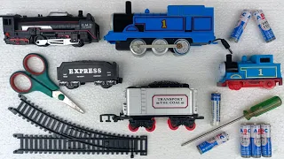 Merakit dan unboxing mainan kereta api thomas besar,thomas kecil,kereta api uap rail king