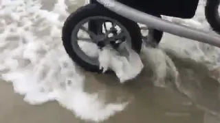Outdoor walker Trionic Veloped on wet beach sand