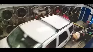 Dramatic video: Security camera catches car crashing into laundromat