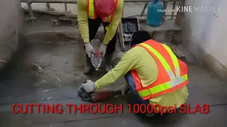 CUTTING AND DRILLING THROUGH SOLID CONCRETE 10,000psi MAN AND MACHINE AT WORK