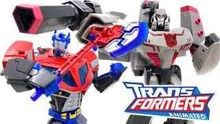 TFA DOUBLE REVIEW! Transformers ANIMATED Leader Class MEGATRON & Voyager Class OPTIMUS PRIME