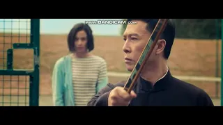 Donnie Yen saves the daughter of a Kung Fu master from classmates in the film IP MAN 4: The Finale