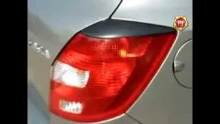 Накладки (реснички) на задние фары Skoda Fabia 2010- (russ-artel.ru)