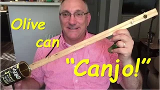 Olive can canjo stringed instrument build (tin can diddley bow)