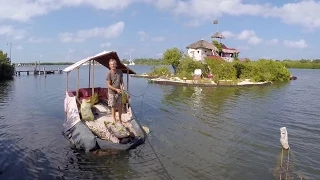 The Plastic Bottle Floating Island - Richart Sowa House Tour