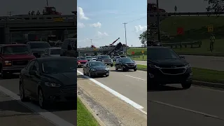 Semi trailer hauling scraps flips over overpass in Davison, Michigan. #news #michigan #crash