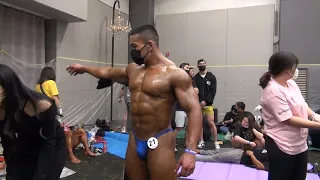 Taiwan bodybuilder backstage tanning