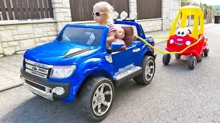 Little Girl Elis Ride On Ford Wildtrak Power Wheel with Cozy Coupe Little Tikes and Dolls Crew