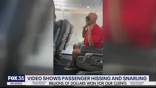 Video shows airplane passenger hissing and snarling