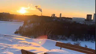 Stockholm Walks: Södermalm hill & shoreline. Footsteps on snow. Mid day sunset. 4k.