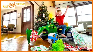 Christmas cleanup with kids ride on Tractor and water trailer inside. Educational | Kid Crew